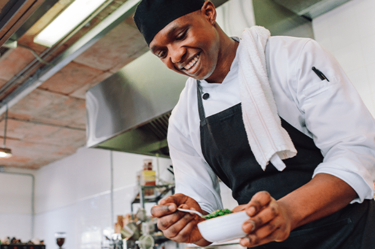 A cooking chef enjoys the benefits of earned wage access.